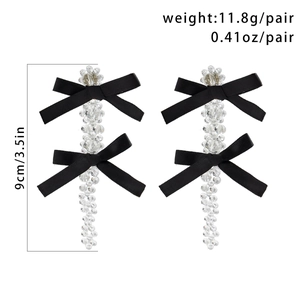 Detailed size view of elegant 9cm crystal bead drop earrings with black ribbon bows