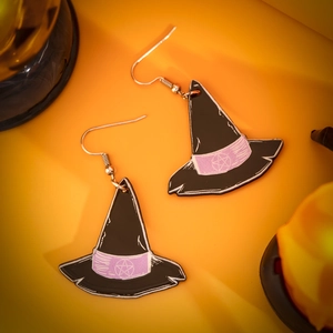 Detail of acrylic witch hat earrings with star pattern for Halloween costume accessory