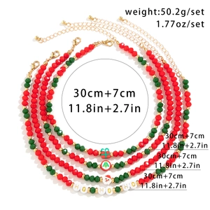 Detailed view of 4-layer Christmas beaded choker set with snowman and Santa charms
