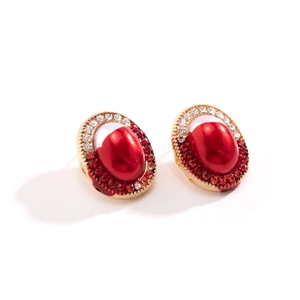 Vintage gothic gold earrings with red cabochon pearls and sparkling rhinestones