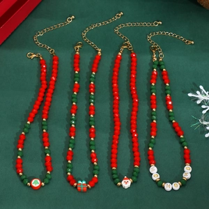 Detailed set of Christmas beaded necklaces with red green beads and festive charms
