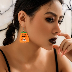Halloween acrylic pumpkin earrings with white ghost charm and evil smile for women