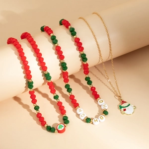 Detail of Christmas beaded necklaces with snowman pendant and festive HO HO HO text beads