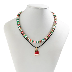 Close-up of double-layered Christmas choker with snowman clay beads and bell pendant