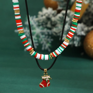Christmas necklace set featuring snowman and reindeer charms on colorful clay beads and choker