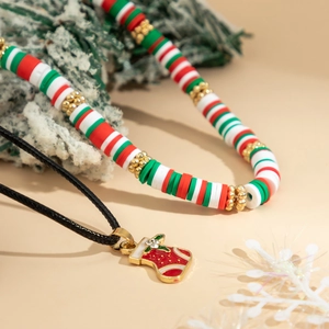 Detail of Christmas beaded choker and enamel stocking pendant necklace set