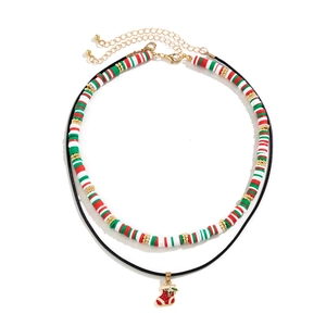 Close-up of double-layered Christmas choker with festive snowman beads and stocking pendant