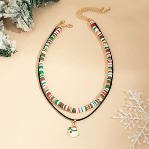 Detailed view of a double-layered Christmas choker with snowman pendant and festive beads