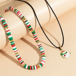 Detailed view of Christmas choker set with red white green beads and snowman pendant