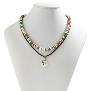 Detail of Christmas snowman pendant on double layer red green and white heishi bead necklace