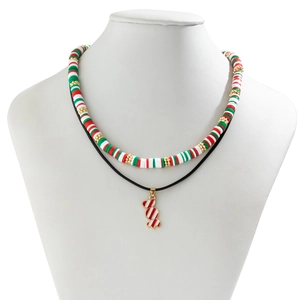 Close-up of layered Christmas choker with colorful clay beads and candy cane pendant