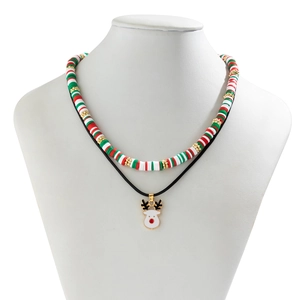 Detail of a Christmas choker with red green white beads and a reindeer pendant