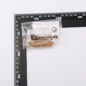 Detailed size measurement of golden punk chain anklet with lobster clasp in packaging