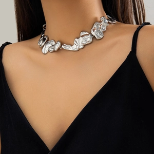 Close-up of a silver liquid metal choker featuring an irregular lava design on a model