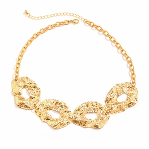 Irregular textured gold pendant necklace with fluid geometric circles and adjustable chain