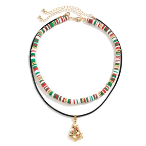 Detail view of double-layer Christmas necklace with festive Heishi beads and tree pendant