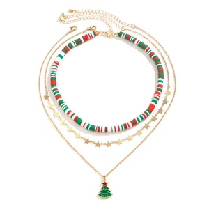 Detailed view of 3-layer Christmas choker necklace with beads and a green tree pendant