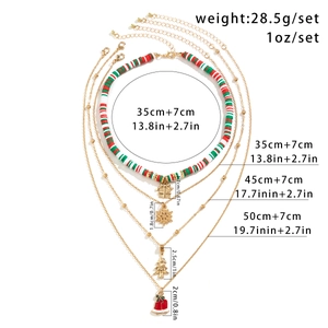 Detailed view of 5-piece Christmas choker set with snowman and elk charms on white background