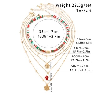 Detailed view of 5-piece Christmas layering necklace set with festive charms and bead choker