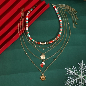 Detail of Christmas multi-layer necklace set with snowmen, gift boxes, and beaded charms