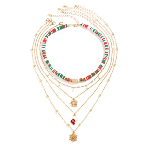 Close-up of a 5-piece Christmas necklace set with polymer clay beads and holiday charms