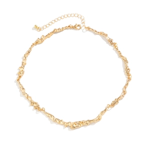 Detail of gold liquid metal choker featuring irregular lava texture and lobster clasp