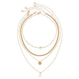 Detail view of 4-piece gold layered necklace set with pearls and floral charms