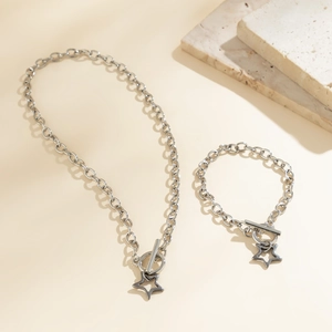 Minimalist silver stainless steel necklace and bracelet set with hollow star pendant and OT toggle