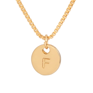 Close-up of gold box chain necklace featuring a circular pendant with an engraved F letter