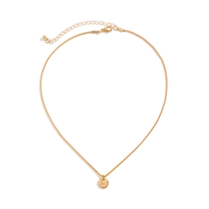 Close-up of gold initial necklace with letter M engraving, lobster clasp and box chain