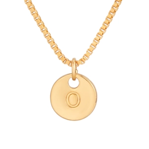 Detail of a gold box chain necklace featuring a round pendant with embossed letter O