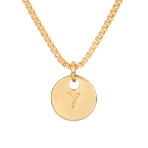 Detailed macro view of a gold-plated box chain necklace with an engraved letter Y pendant