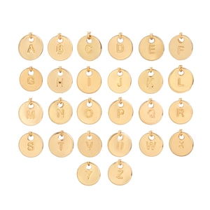 Set of 26 gold round pendant charms with A-Z alphabet engravings for DIY jewelry