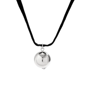 Minimalist silver spherical pendant on a black cord necklace shown against white backdrop