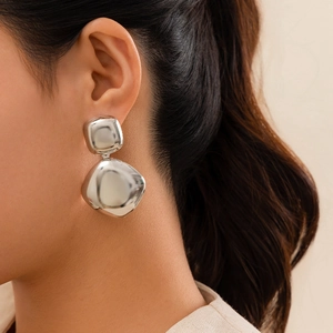 Minimalist silver geometric earrings with irregular double squares and liquid metal finish