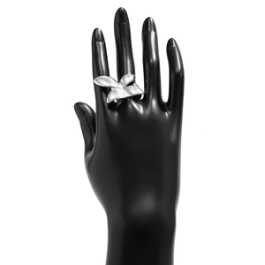 Silver flowing petal ring showcased on a finger model with a modern aesthetic design
