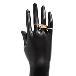 Polished gold multi-layer wrap ring with minimalist bar detail on a black hand model