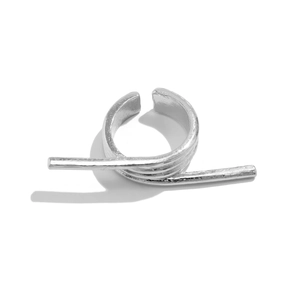 Close-up of a silver-toned open double-finger ring with a sleek metallic bow-knot design