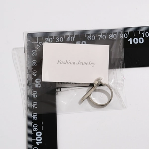 Silver butterfly ring dimensions shown with a measurement ruler for size reference