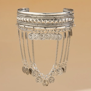 Bohemian retro silver arm cuff featuring metal fringe tassels and embossed coin charms