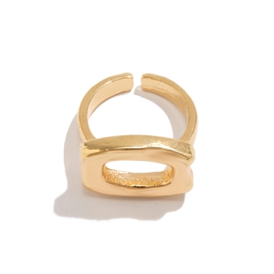 Macro shot of wide hollow rectangular gold ring with adjustable open back design