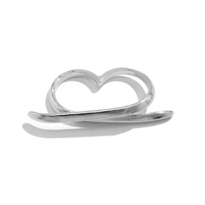 Macro shot of silver double-finger heart ring with polished mirror finish surface