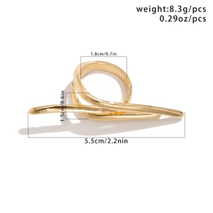 Macro shot of gold tone irregular finger ring with fluid lines and size measurements