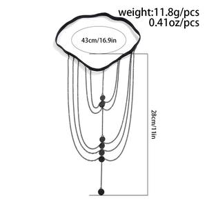 Detail view of multilayer leg chain with elastic strap and metal pendant dimensions