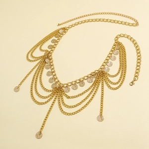 Detailed view of golden multi-layer waist chain with coin pendants and lobster clasp
