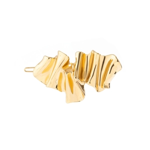 Detail view of the irregular fold design and golden metallic texture of the hairpin