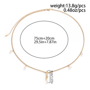 Cadena de cuerpo dorada con perlas y brillantes con medidas detalladas de 75 cm de largo