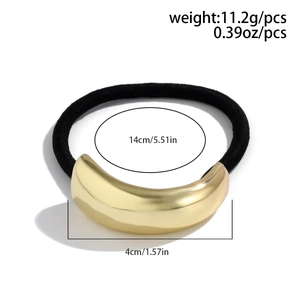 Detail view of black hair tie with 4cm gold metal moon ornament and size measurements