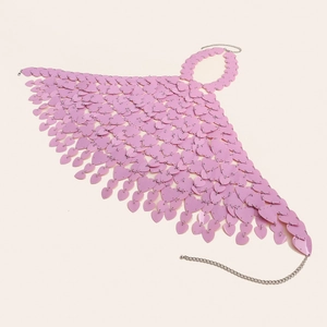 Detail of pink heart-shaped sequin body chain with metal rings and halter neck tie