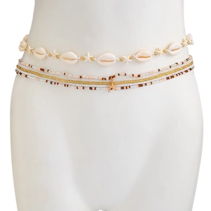 Detailed view of ocean style waist chain with white shells, starfish, and golden beads
